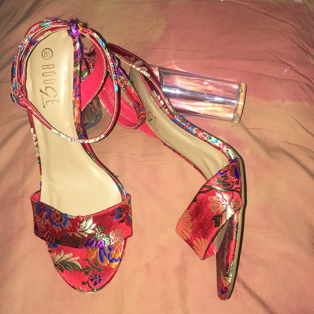 red fabric heels with floral designs